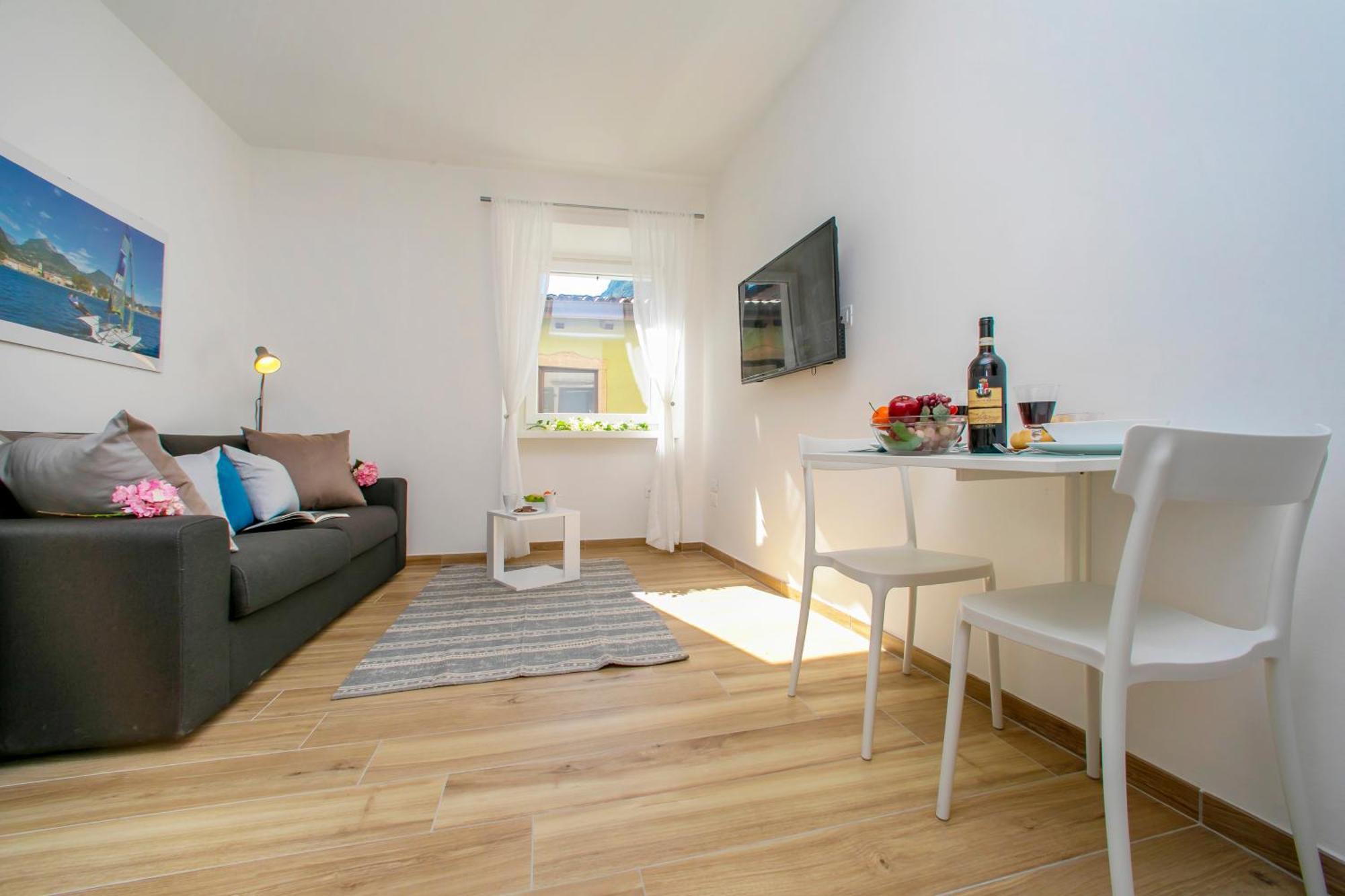 Nido Sui Tetti Di Riva Del Garda - Happy Rentals Extérieur photo