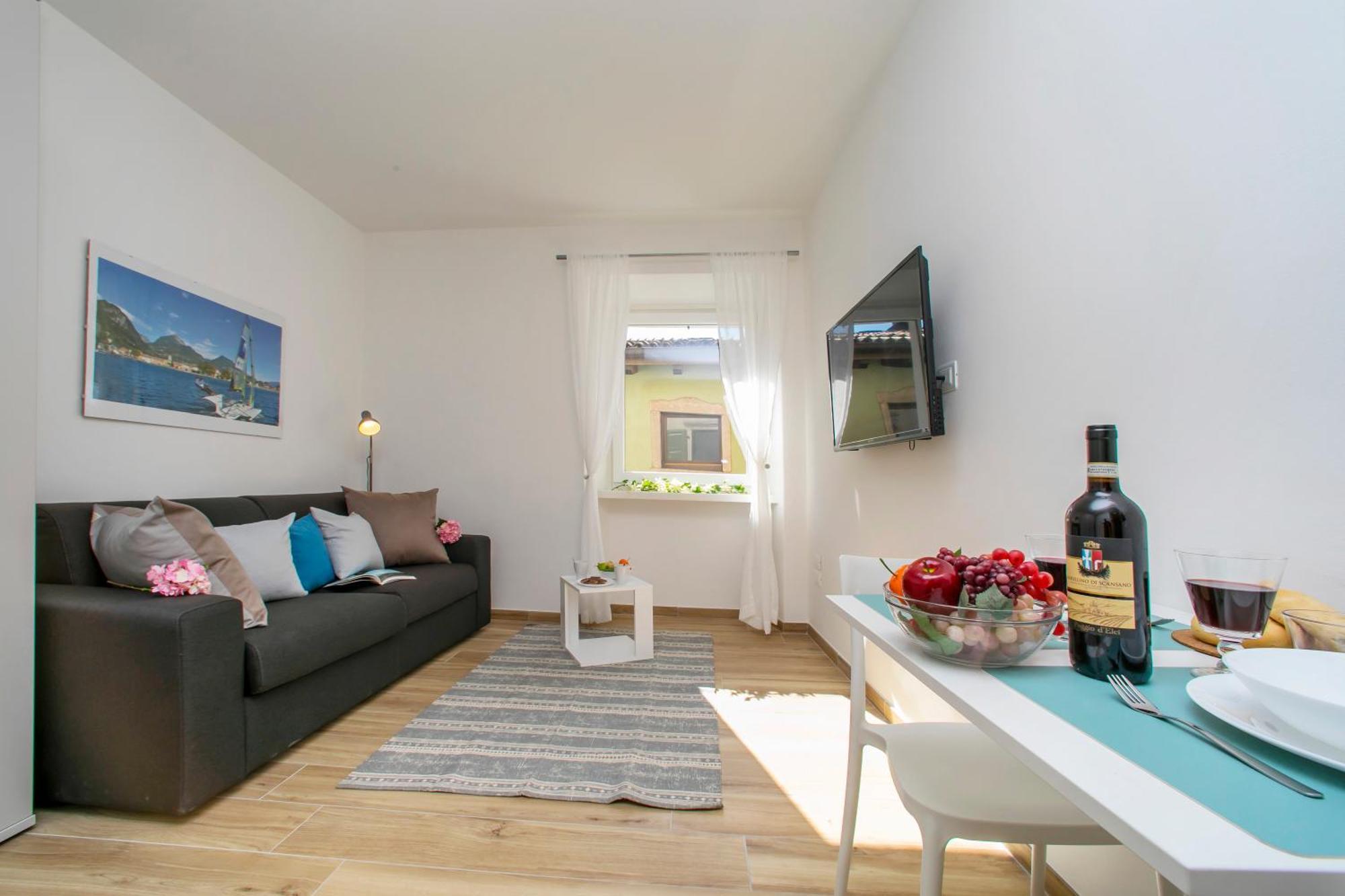 Nido Sui Tetti Di Riva Del Garda - Happy Rentals Extérieur photo
